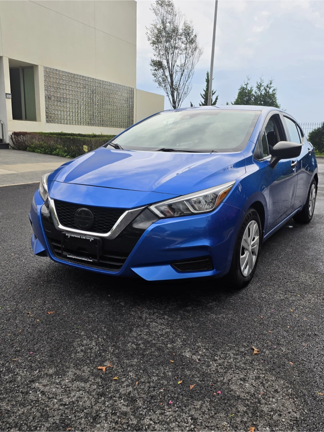 Blue Nissan Versa Sedan