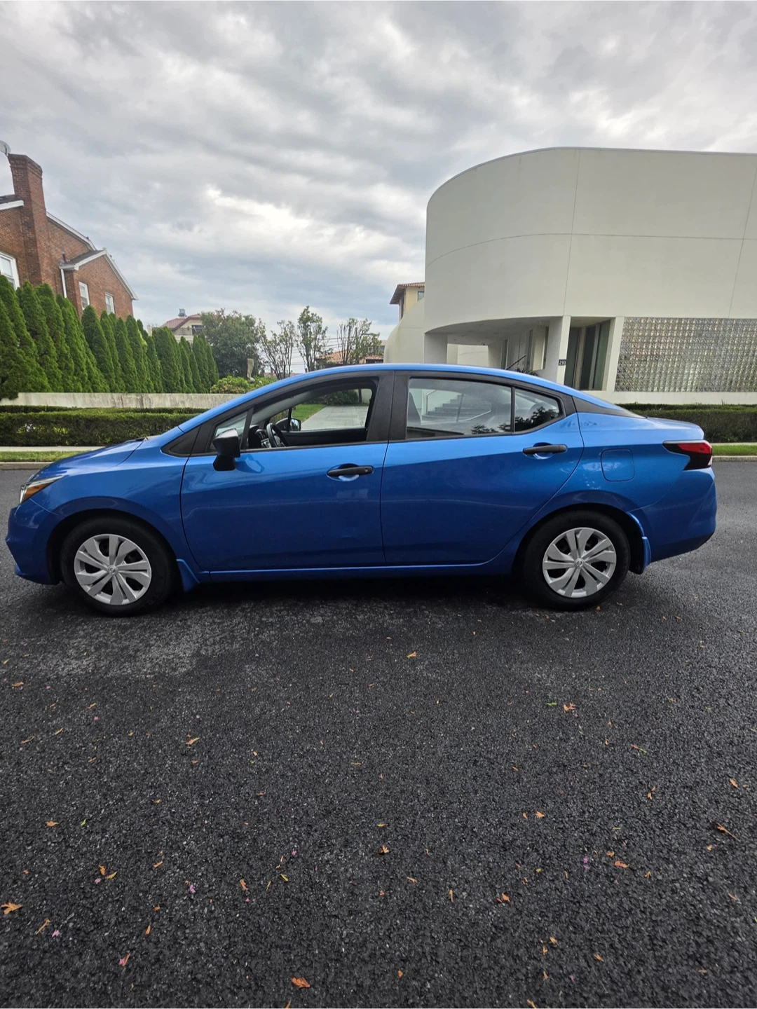 Blue Nissan Versa Sedan - photo 2