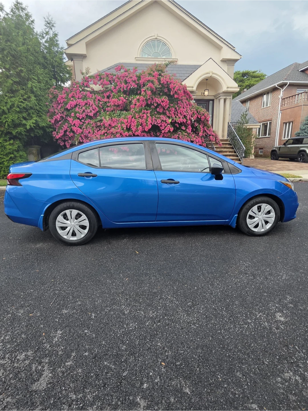 Blue Nissan Versa Sedan - photo 4