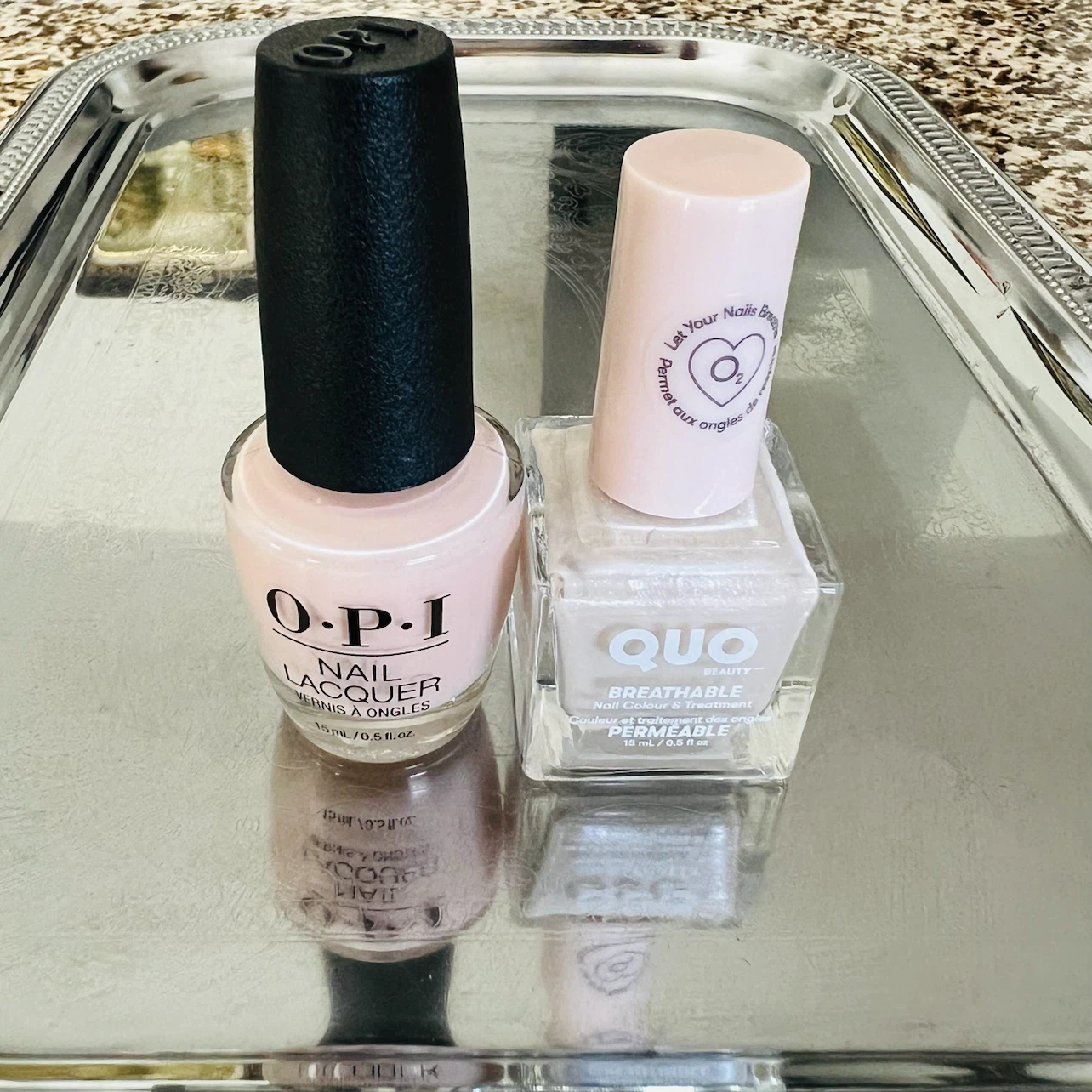 Nail polish O•P•I and QUO