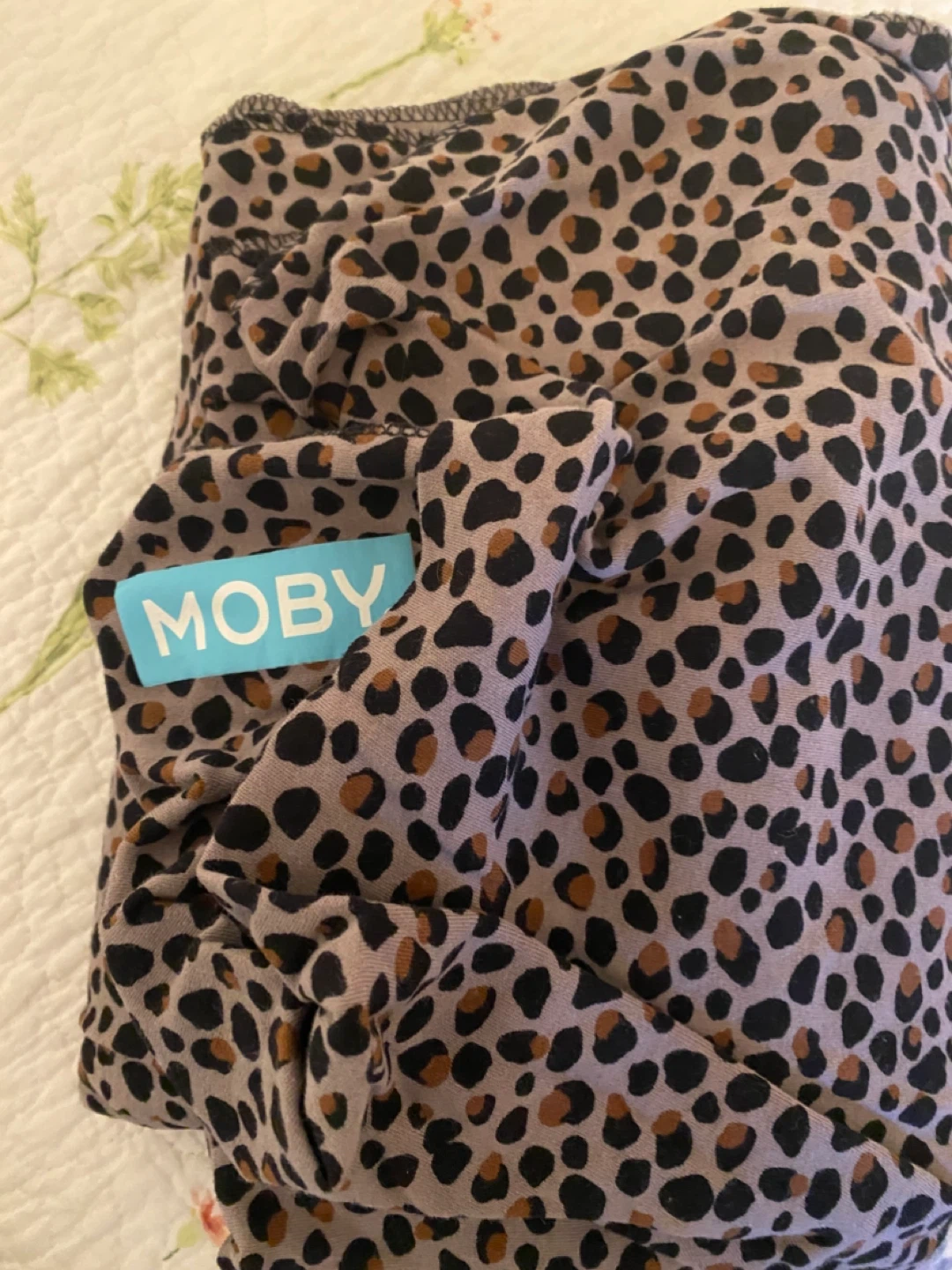Baby items: Moby, sun shade, nursing cover, change pad