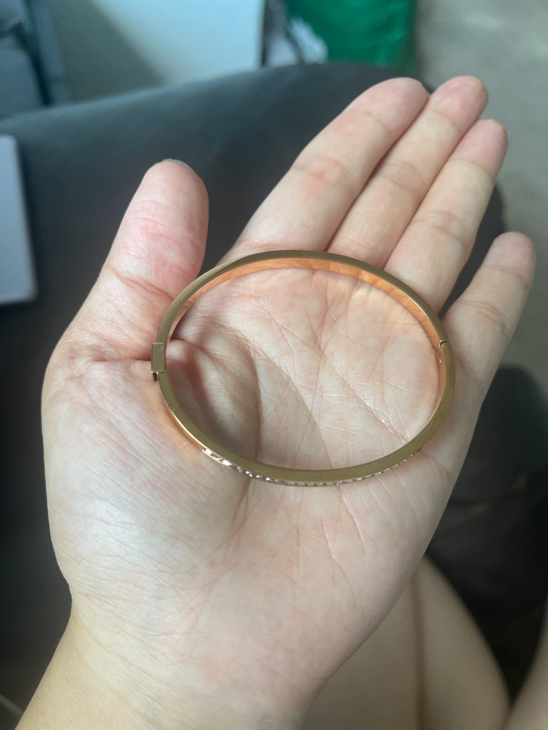 Gold coloured bracelet with rhinestones
