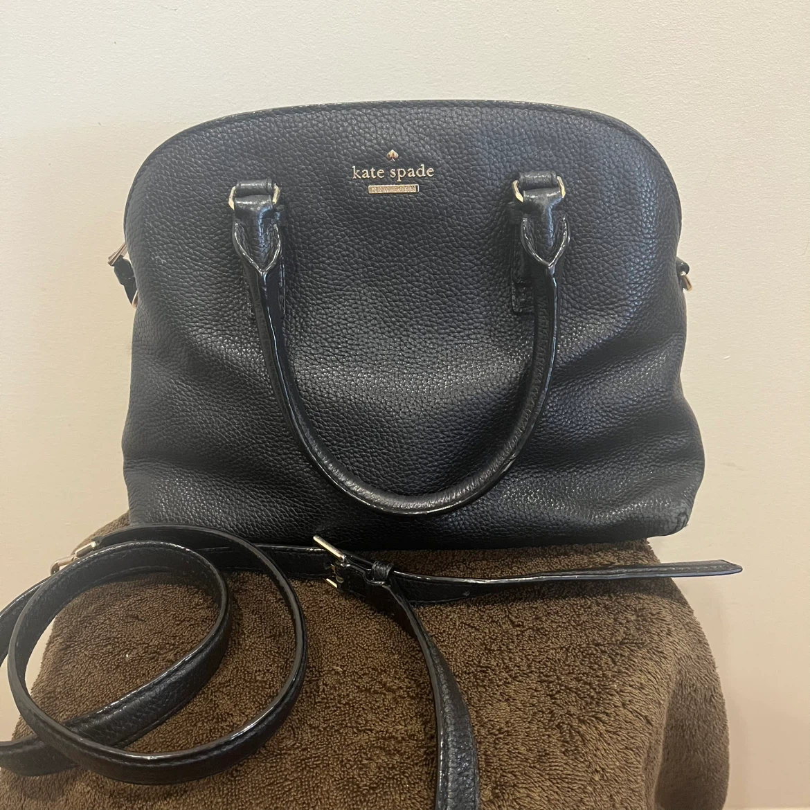 Kate spade black leather crossbody. I’m open to offers.