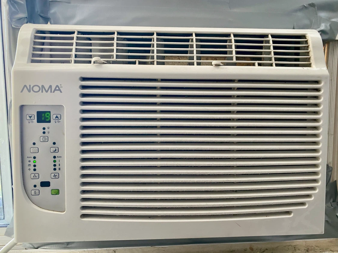 Air Conditioner with Dehumidifier and Fan Settings