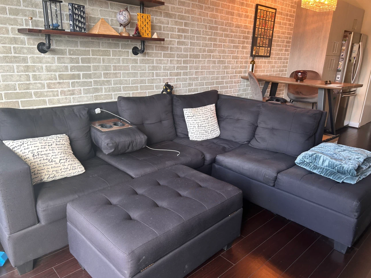 Large Black Sectional + Oversized Ottoman