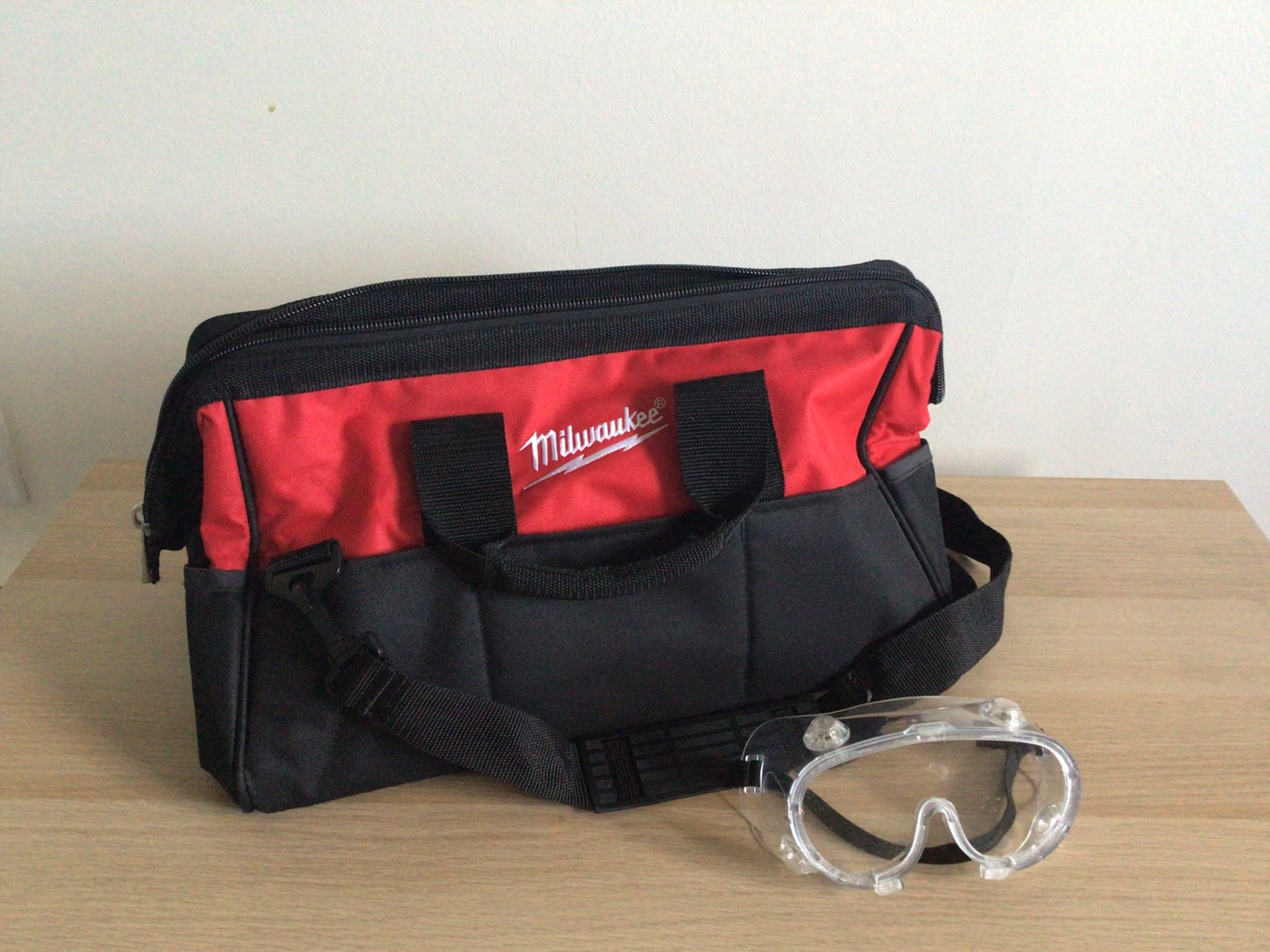 Milwaukee Red and Black Tool Bag with Safety Glasses