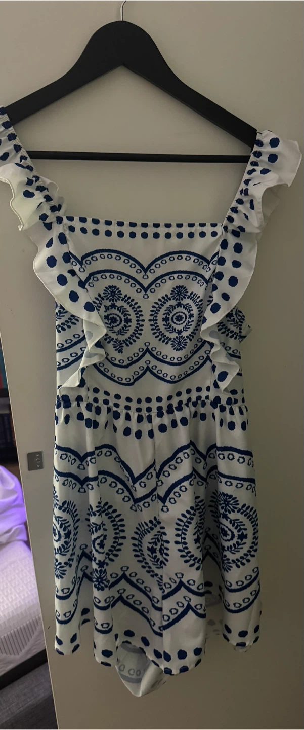 White and Blue Patterned Romper with Ruffles