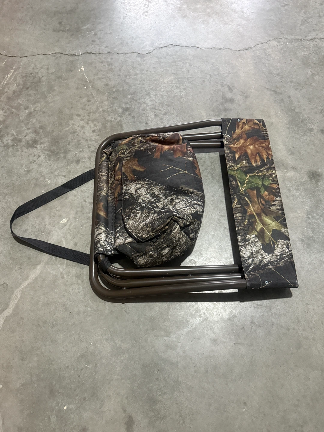 Folding Chair with a cooler bag and strap