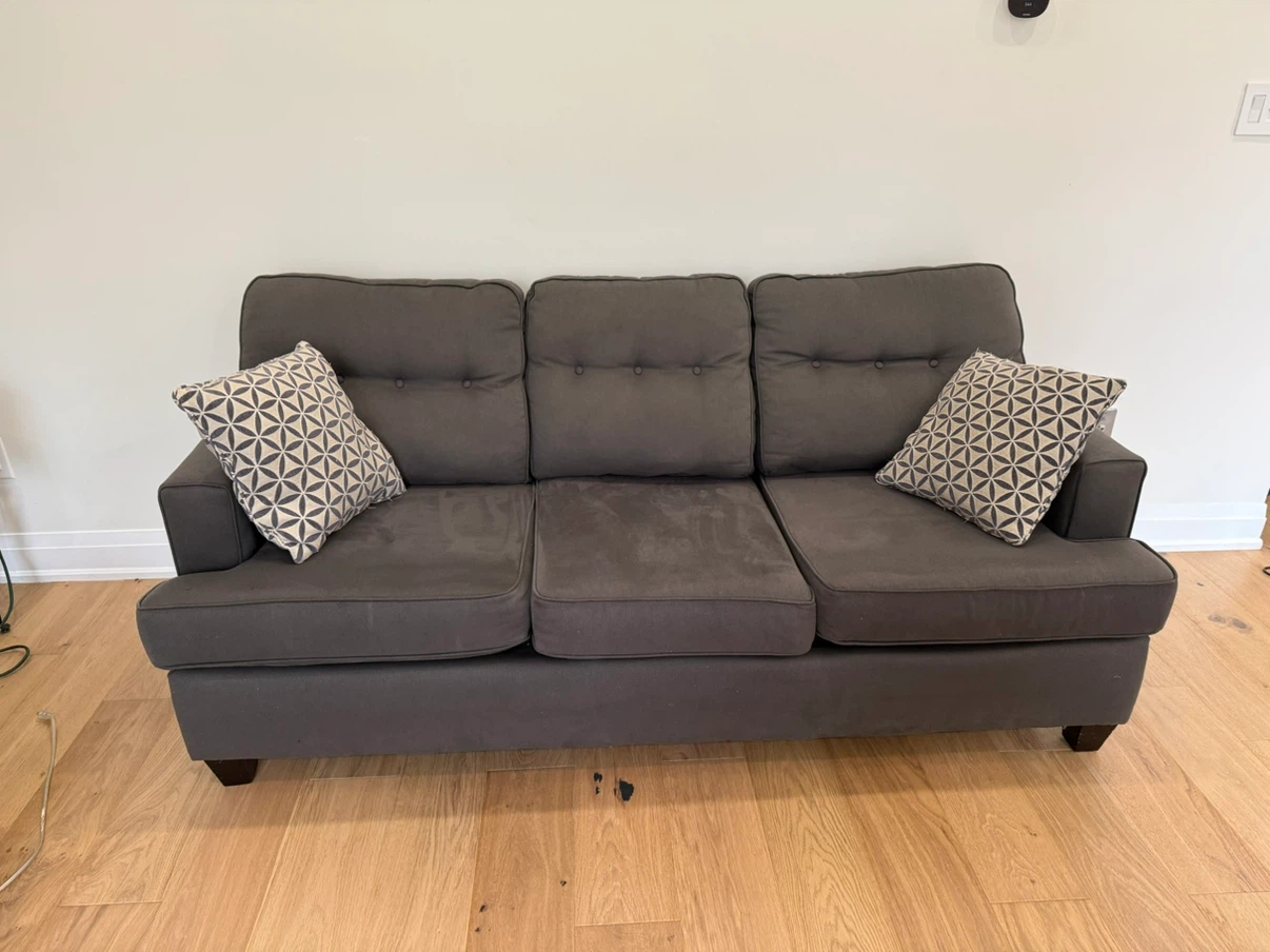 Gray sofa and love seat in excellent condition