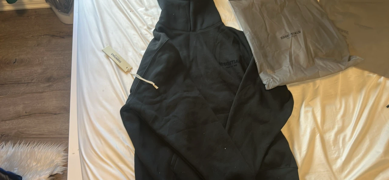 Brand new essentials hoodie both medium