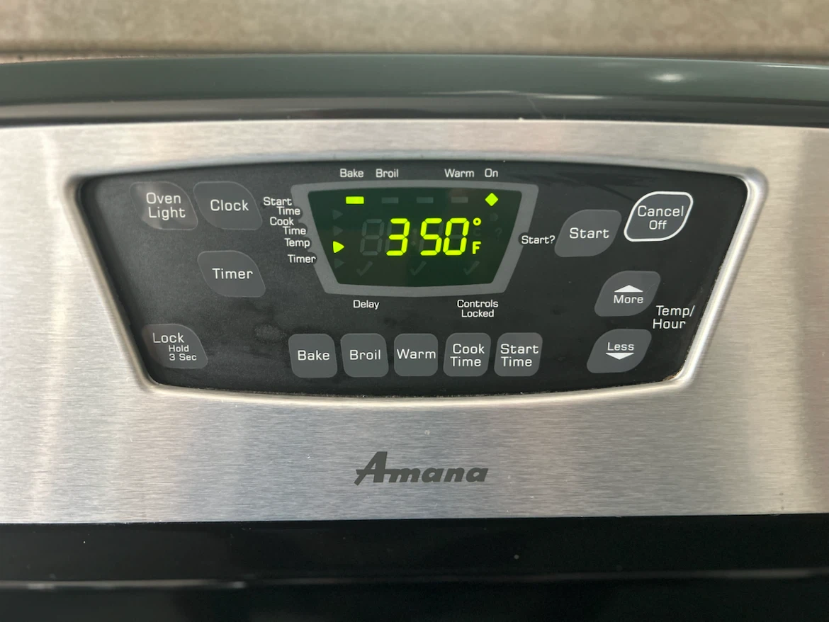 Stainless steel Amana electric range with a black glass cooktop - photo 3