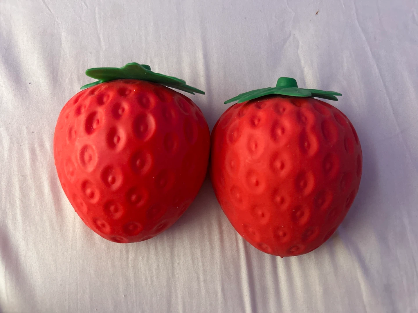 2 jumbo Strawberry squishy toys