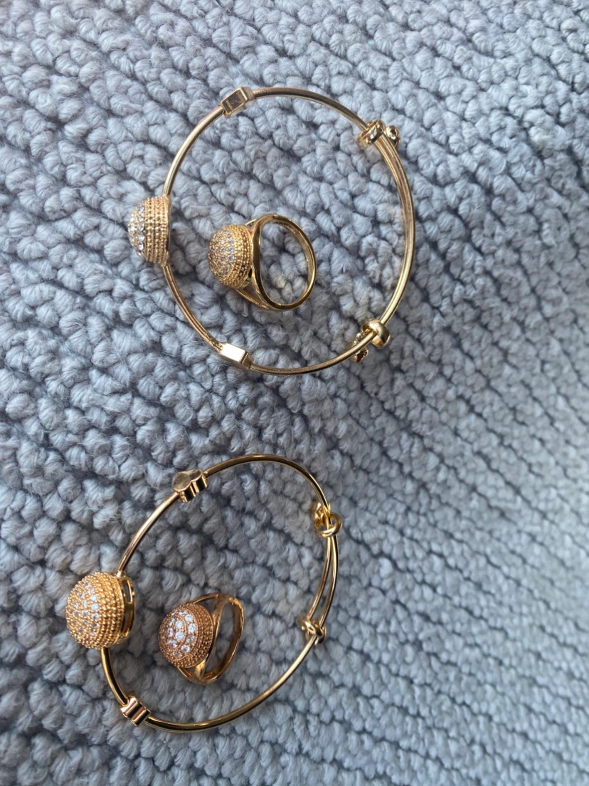 Gold-tone bangle and ring set with rhinestones( 15each)