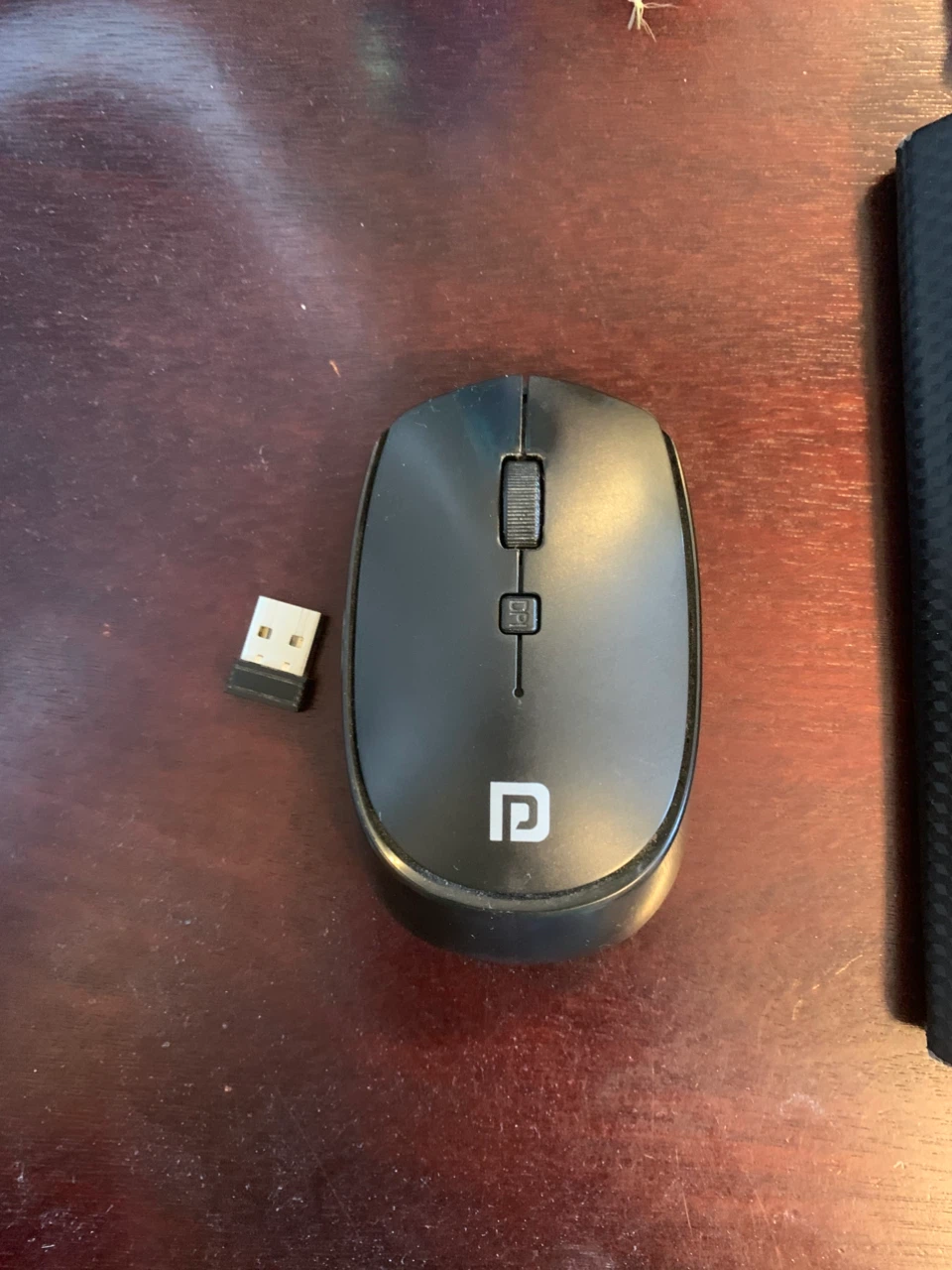 Portronics Wireless Mouse with its usb receiver