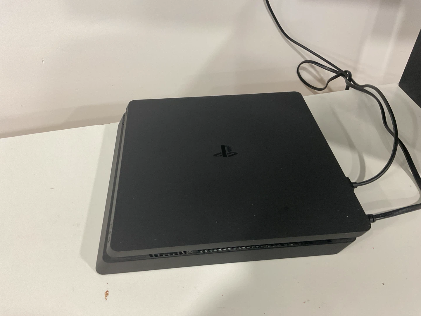 Sony PlayStation 4 Slim Console with 3 Controllers