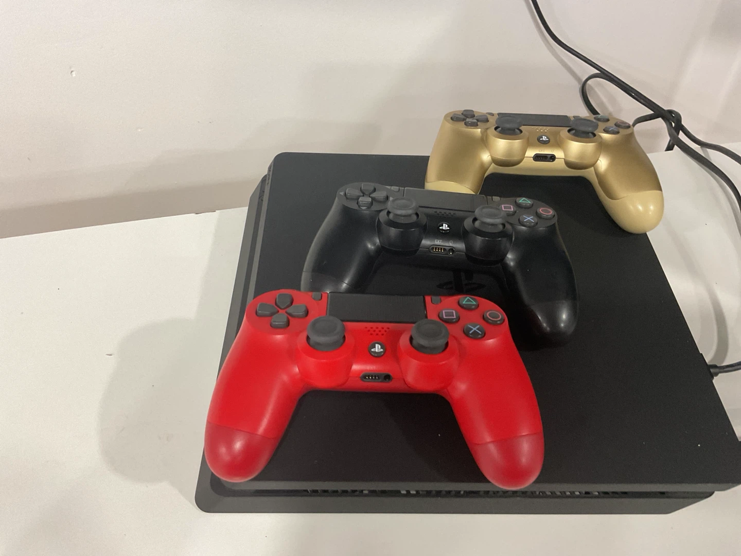 Sony PlayStation 4 Slim Console with 3 Controllers - photo 2