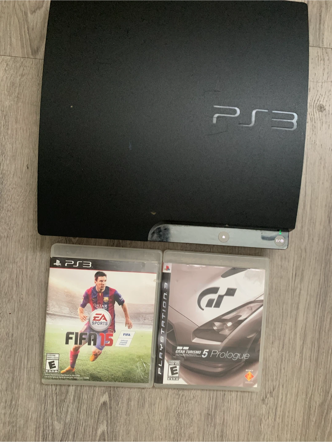 PlayStation 3 Console with FIFA 15 and Gran Turismo 5