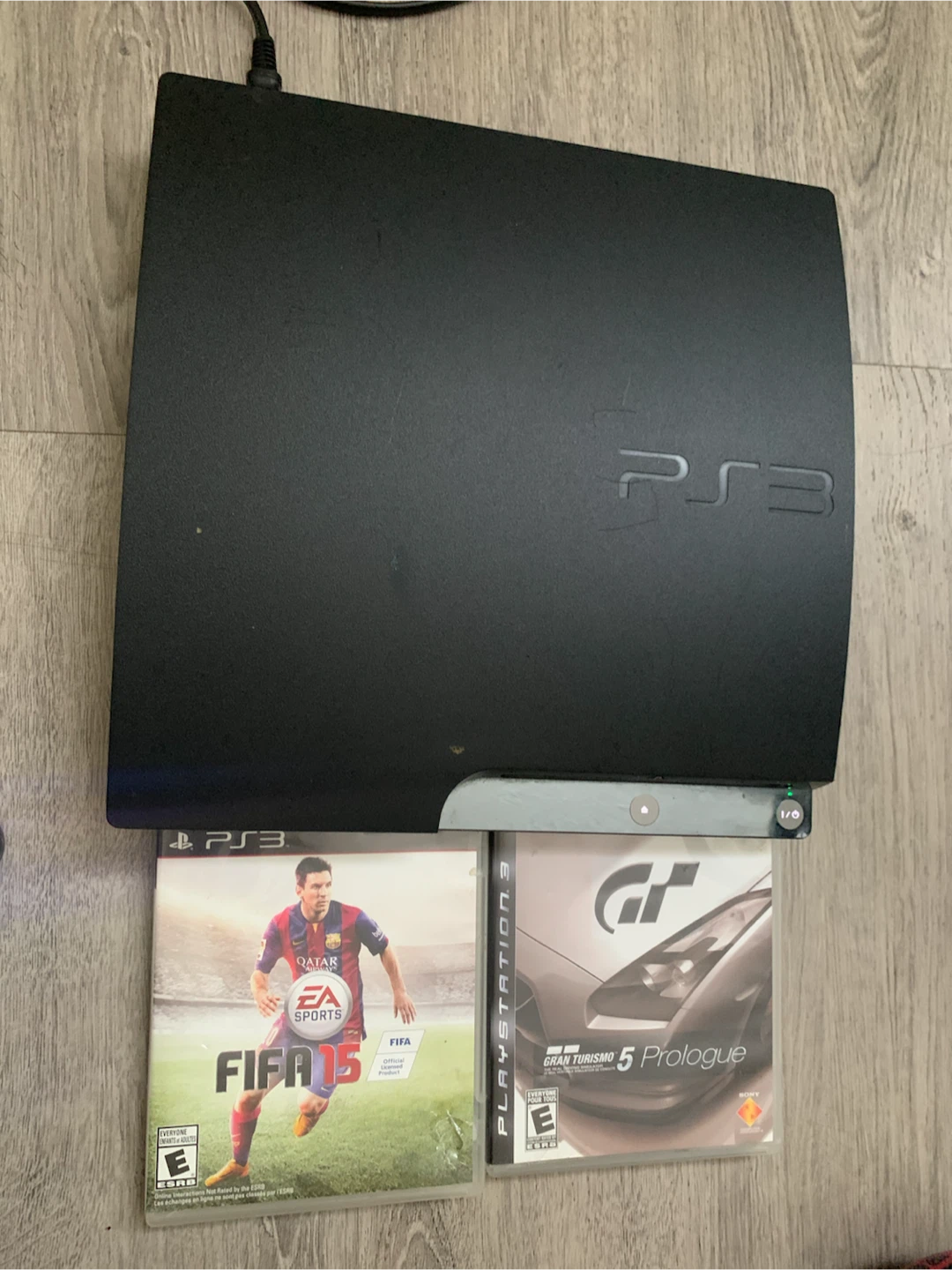 PlayStation 3 Console with FIFA 15 and Gran Turismo 5 - photo 3