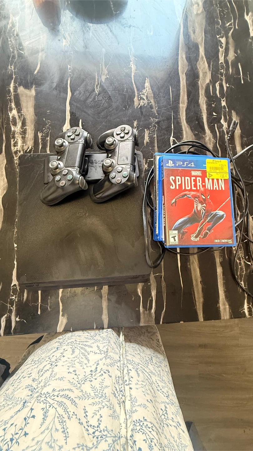 PlayStation 4 Console with 2 Controllers and Games