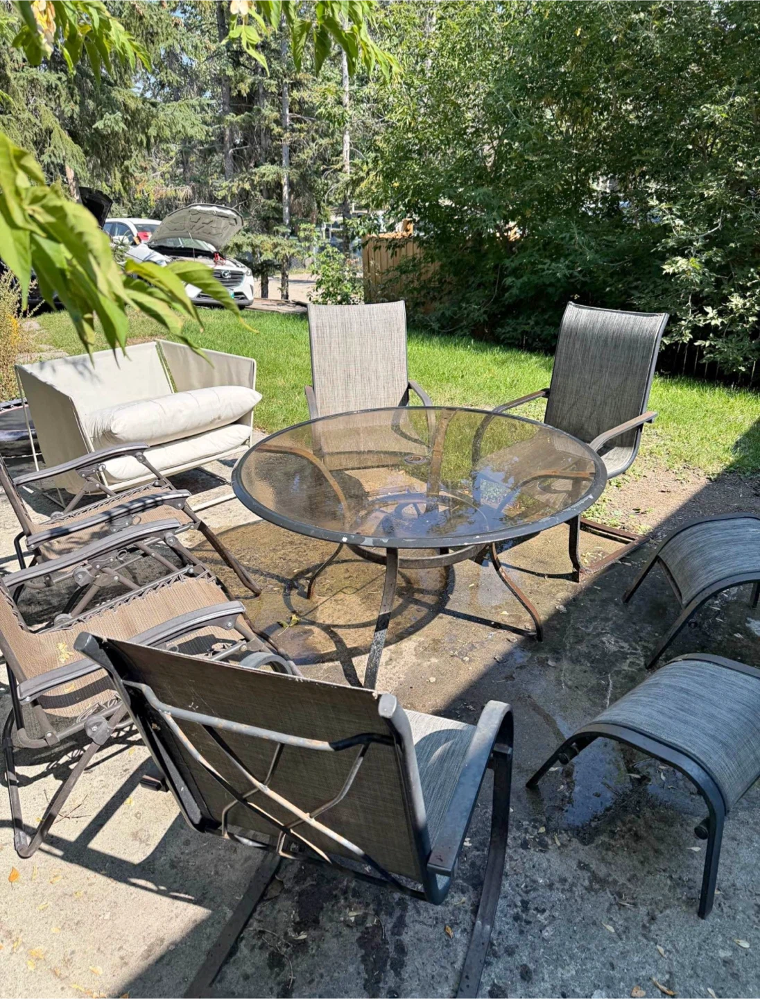 Glass top patio table and chairs set