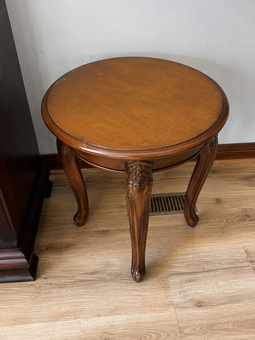 Round wooden accent table