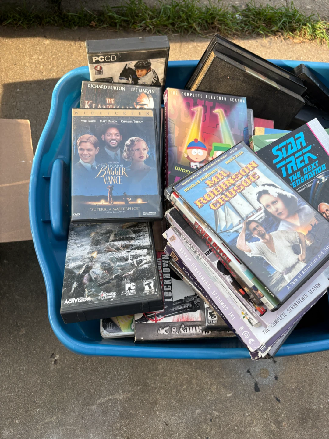 Assorted DVDs and VHS Tapes