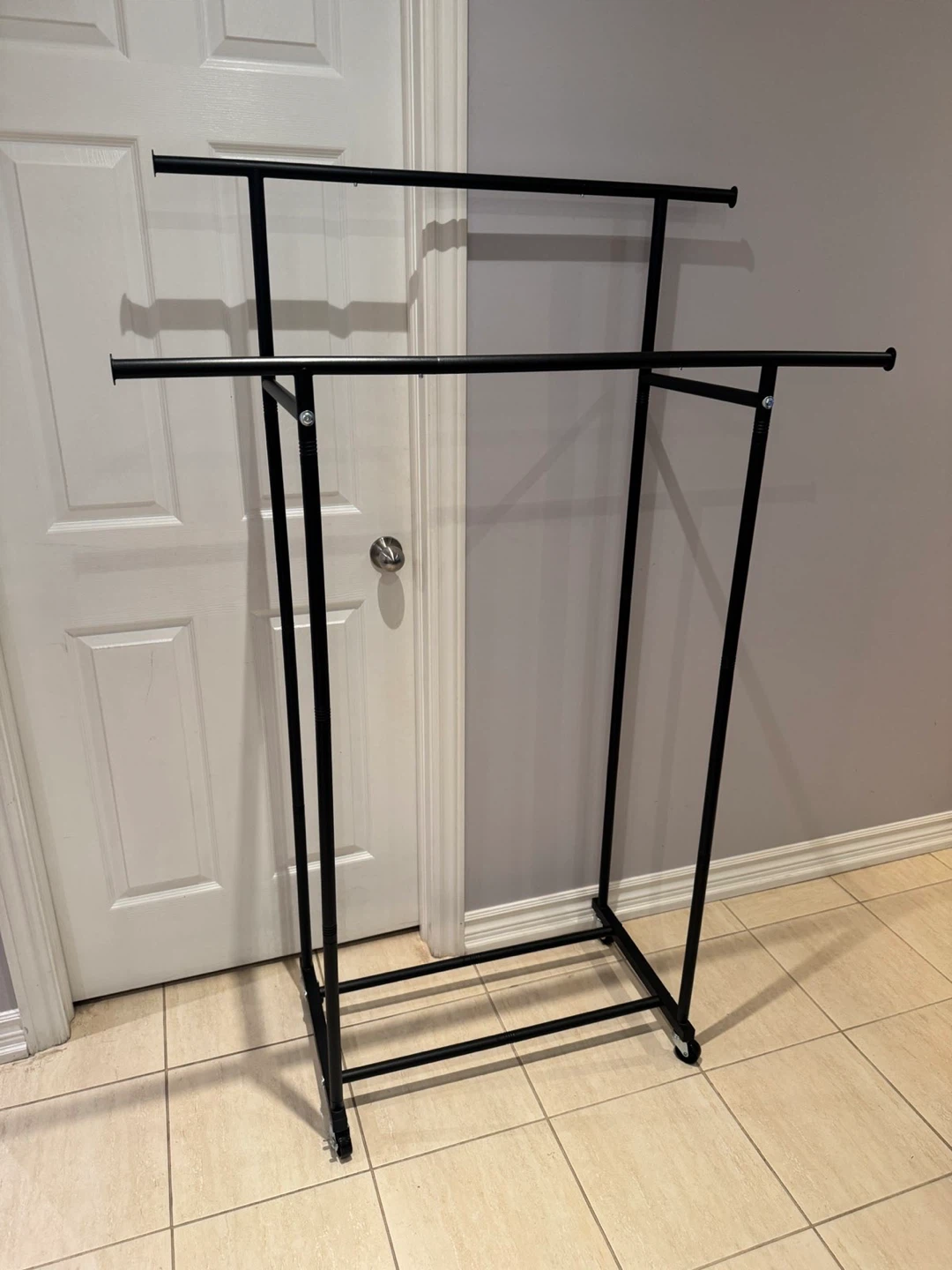 Black Metal Double Garment Rack with Wheels