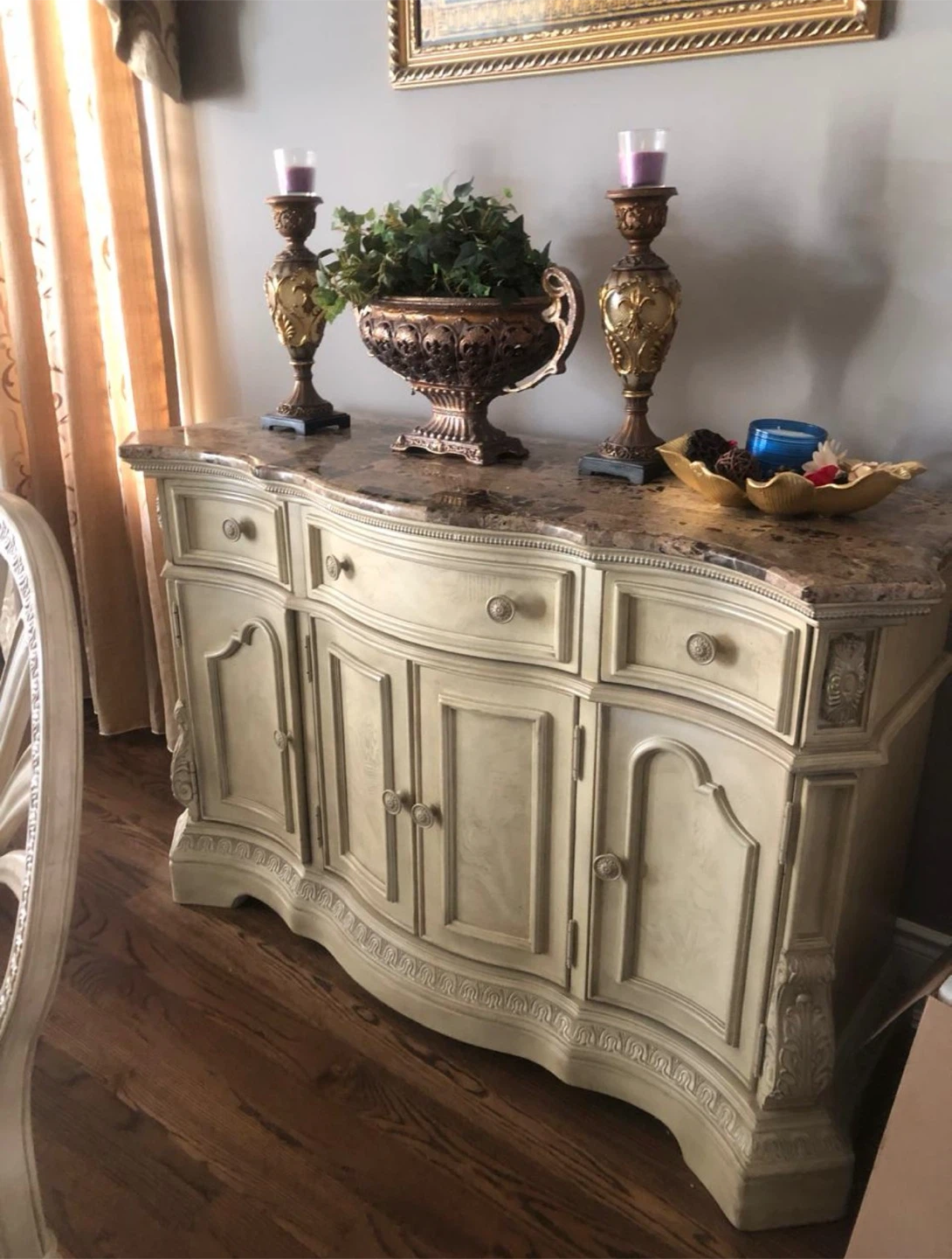 Cream coloured buffet with marble top