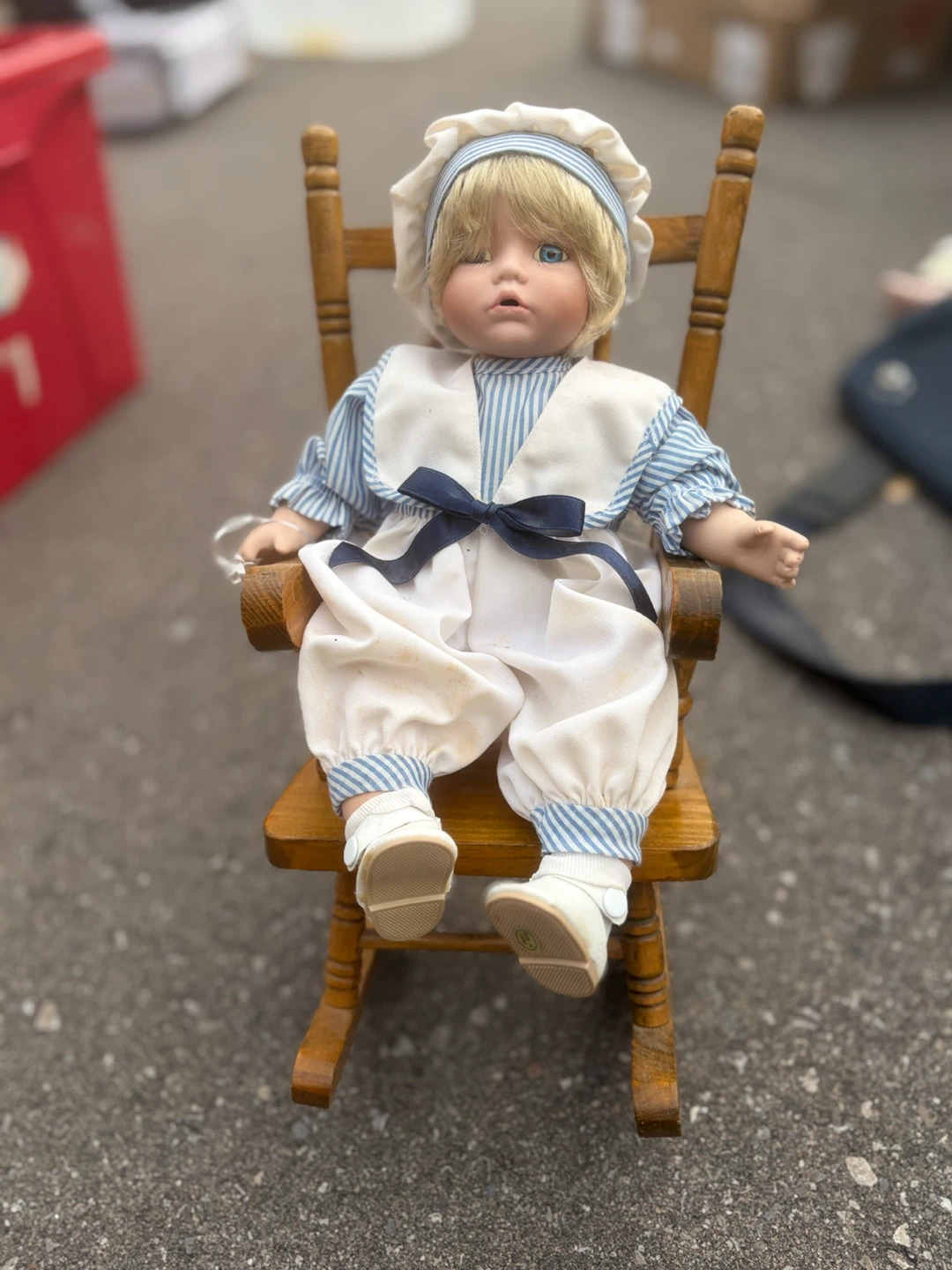 Vintage Porcelain Doll in Rocking Chair