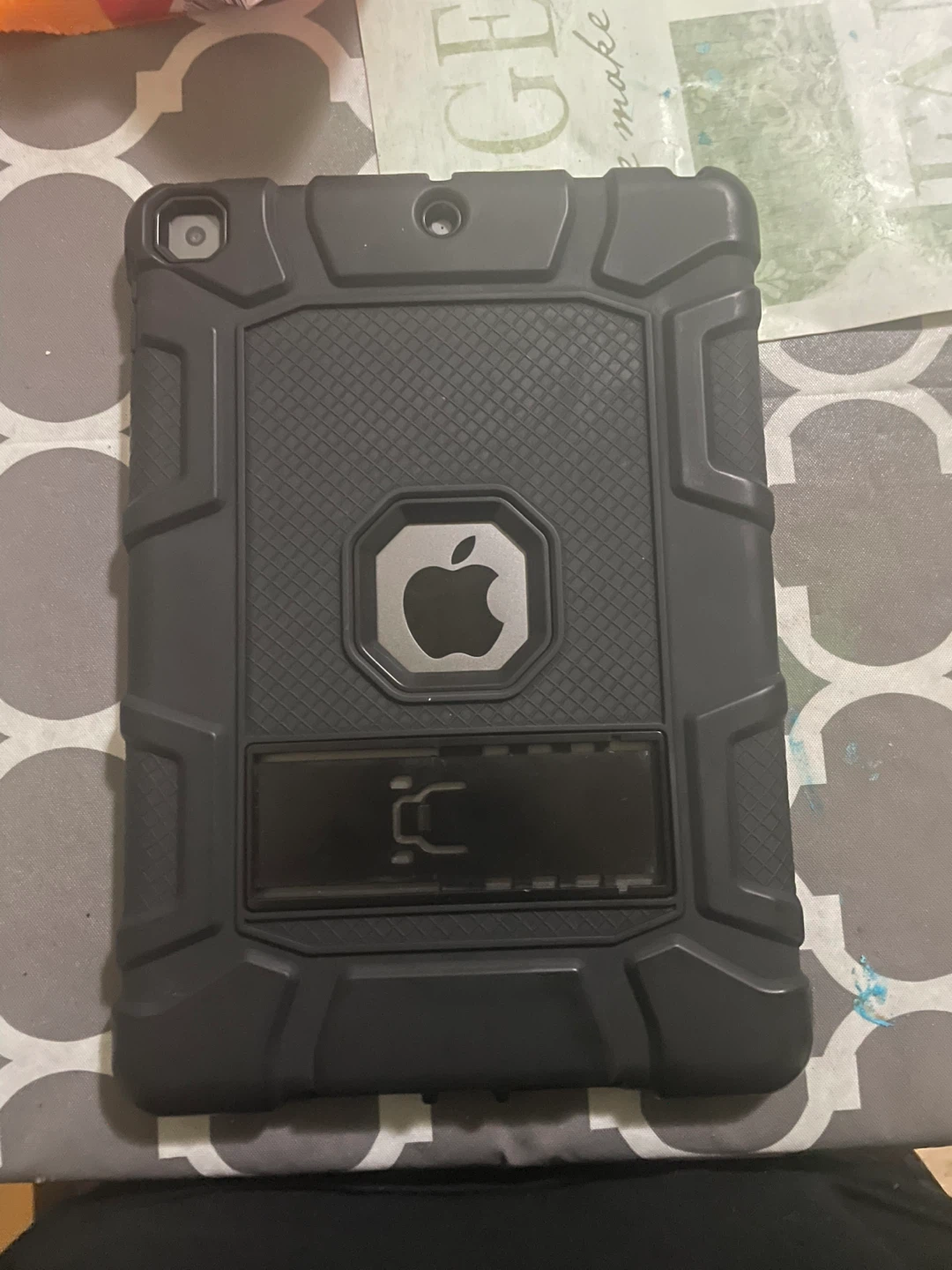 iPad 7th generation with case and screen protector.