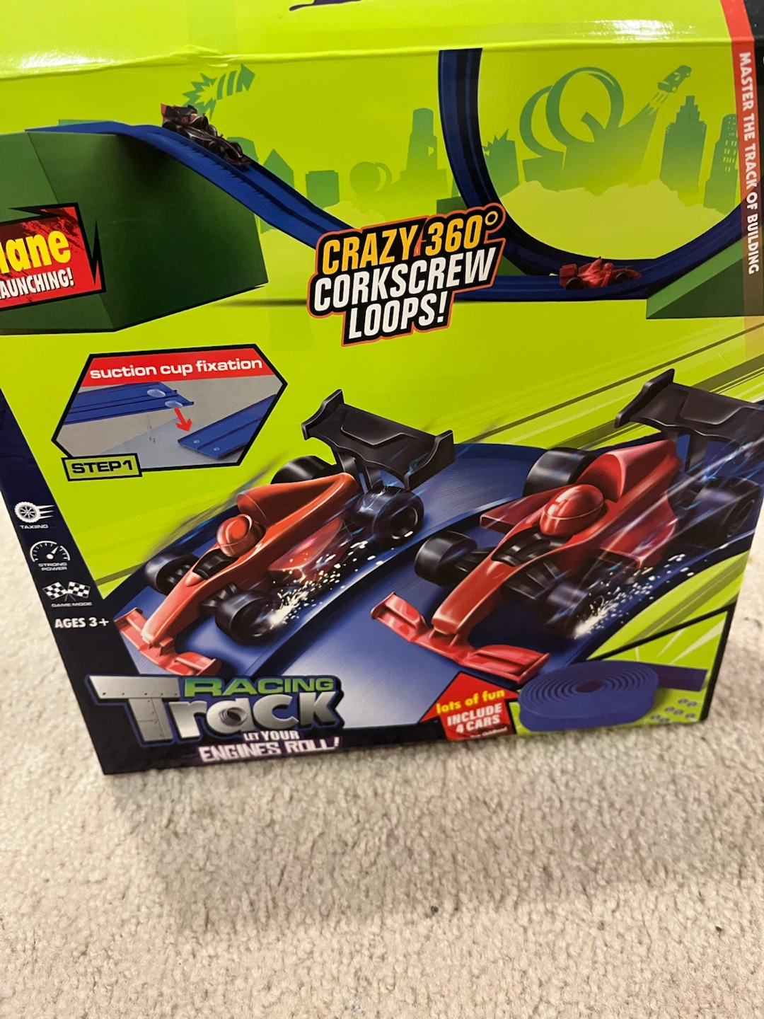 Racing Track Toy with Corkscrew Loops and 4 Cars
