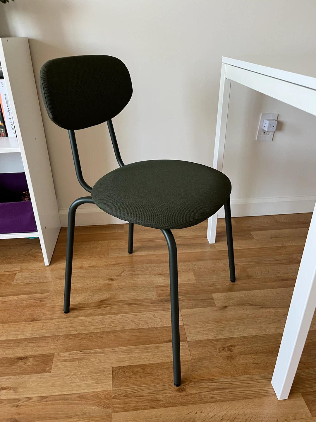 White dinning table with two dark green chairs - photo 3