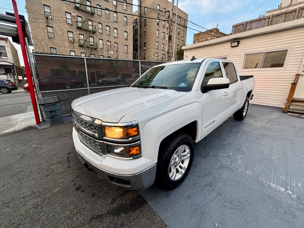 White Chevrolet Silverado LT 4x4 Pickup Truck
