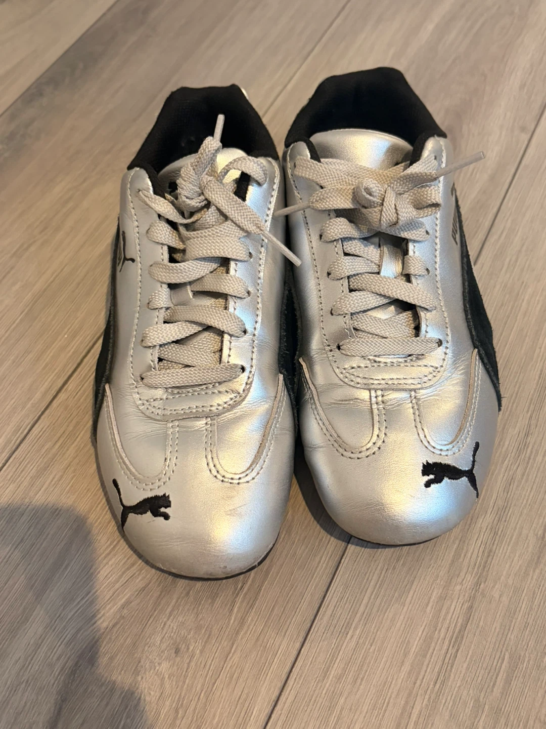Puma Silver and Black Shoes
