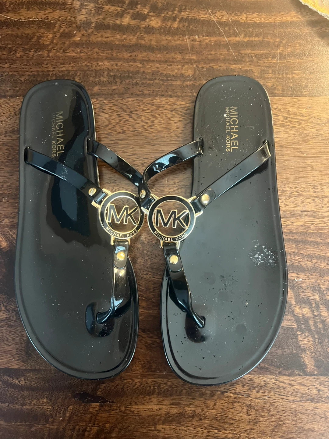 Michael Kors Black flip flops size 9