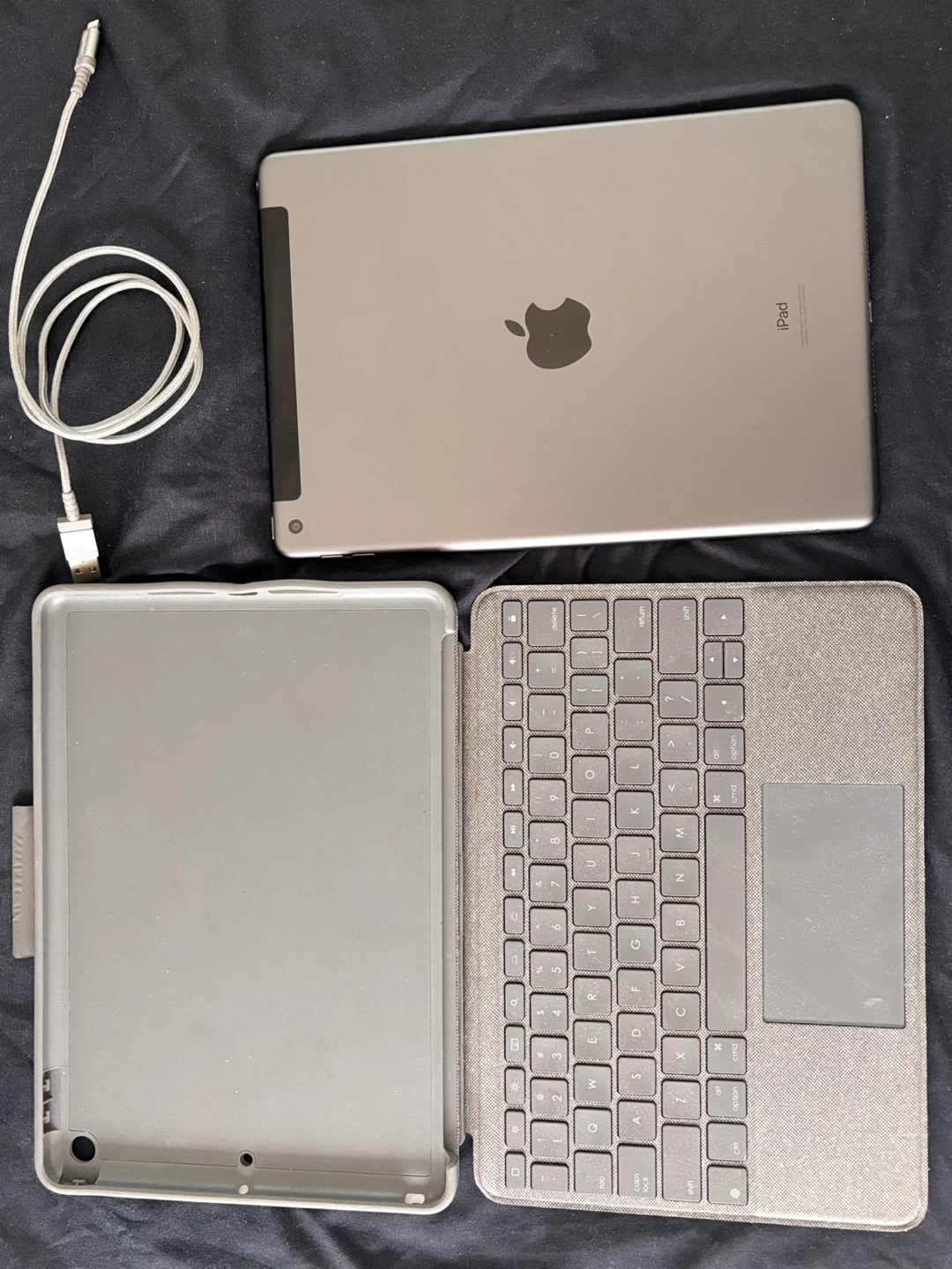 Apple iPad with Keyboard Case and charging cable