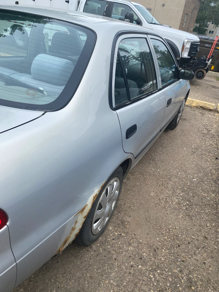 Silver Toyota Corolla CE
