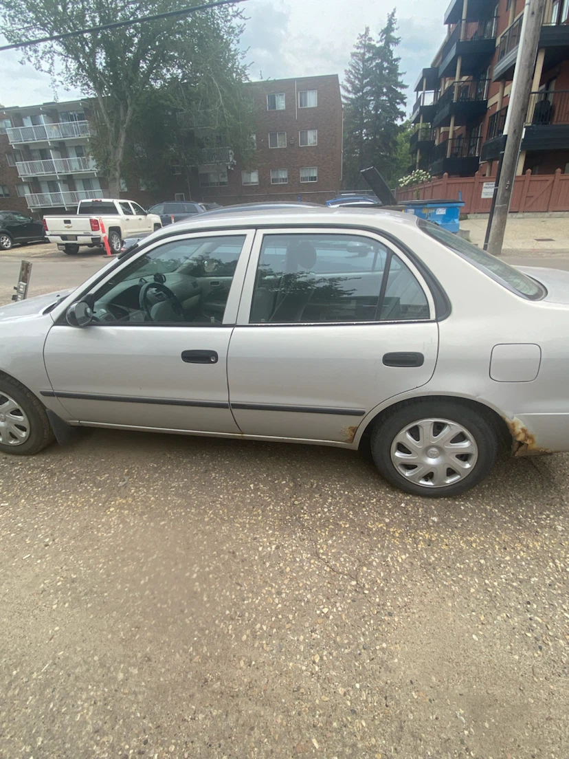 Silver Toyota Corolla CE - photo 5