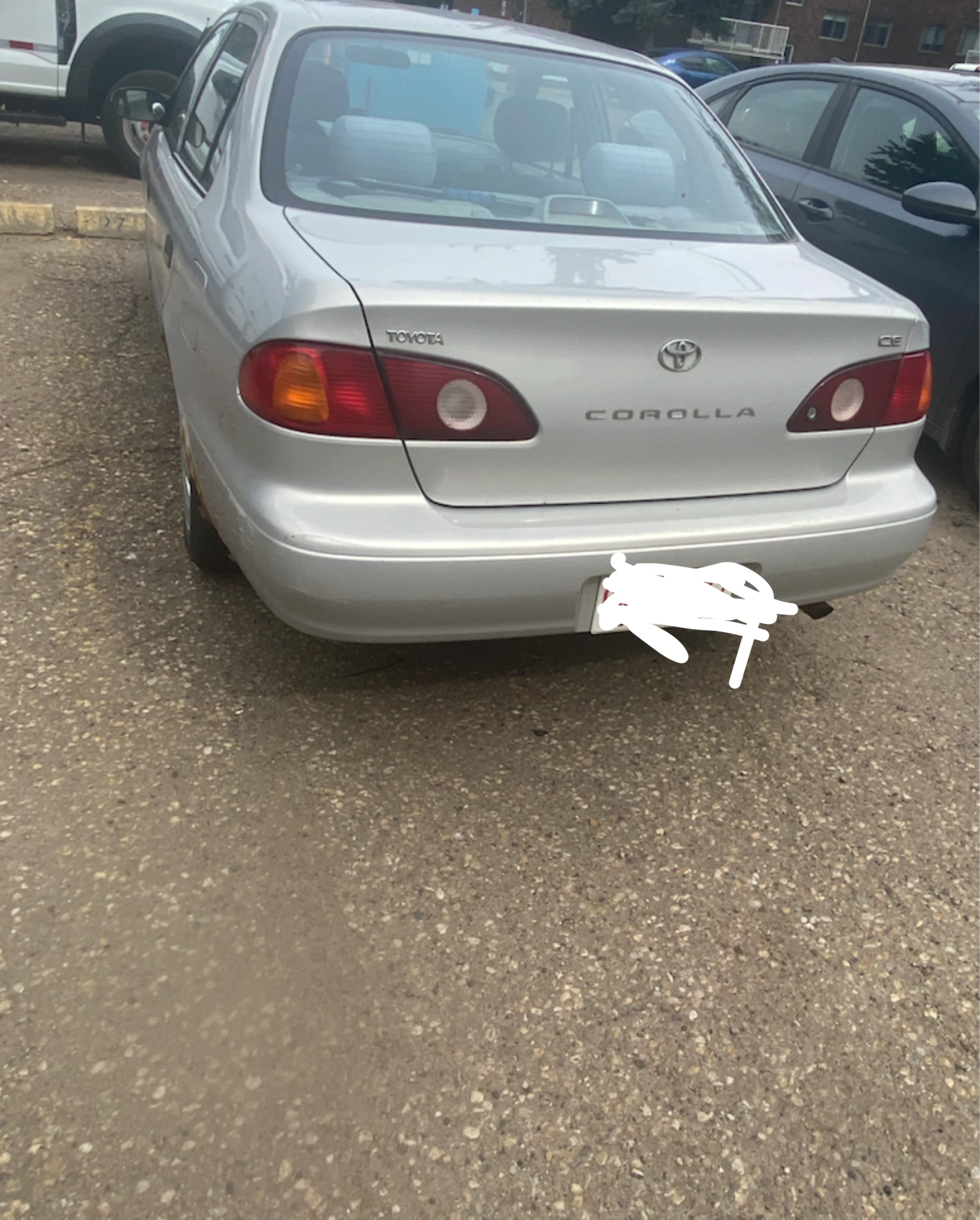 Silver Toyota Corolla CE - photo 2
