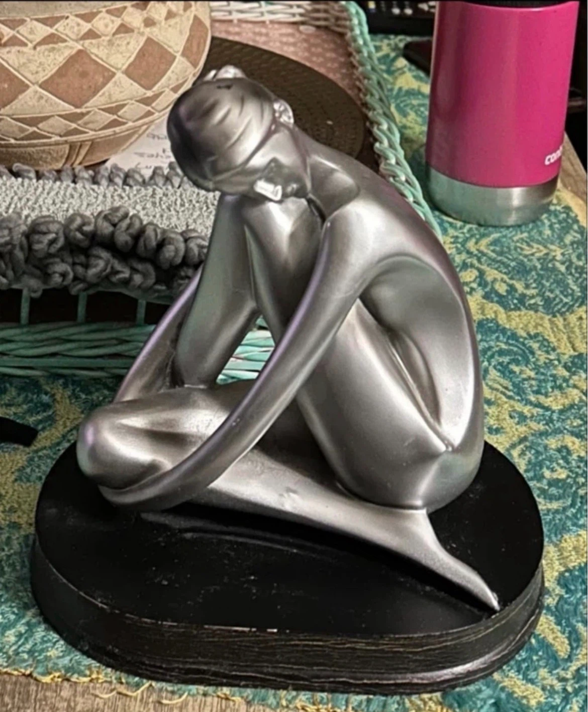 Silver Figurine of Seated Woman