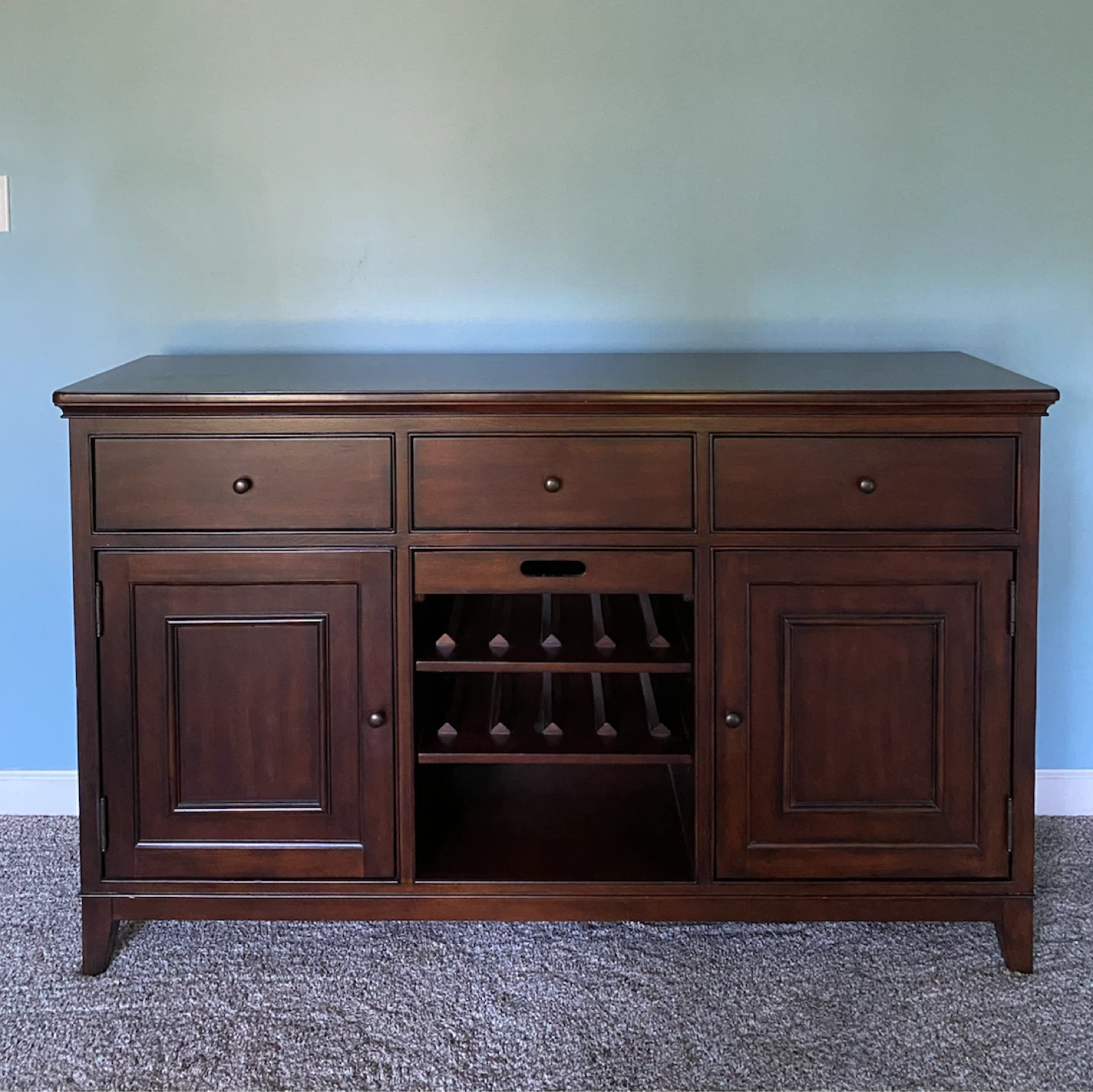 Dark wood sideboard