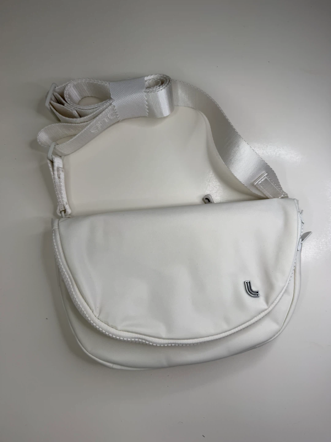 White Lolë Crossbody Bag