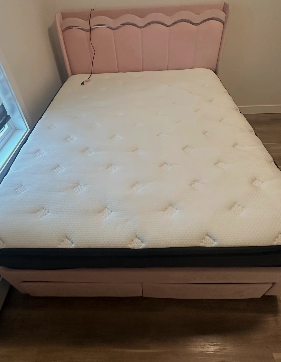 Pink queen size bed with mattress and drawers