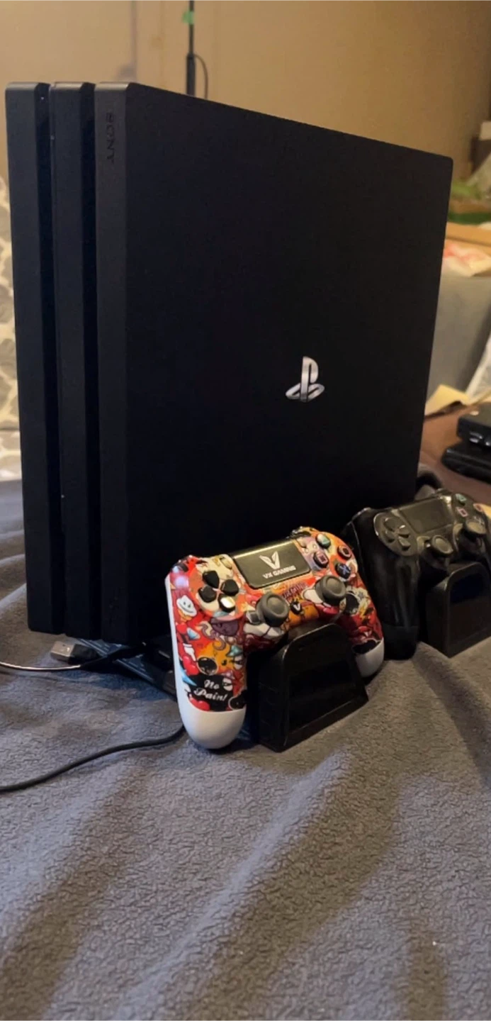 Sony PlayStation 4 Pro + Accessories