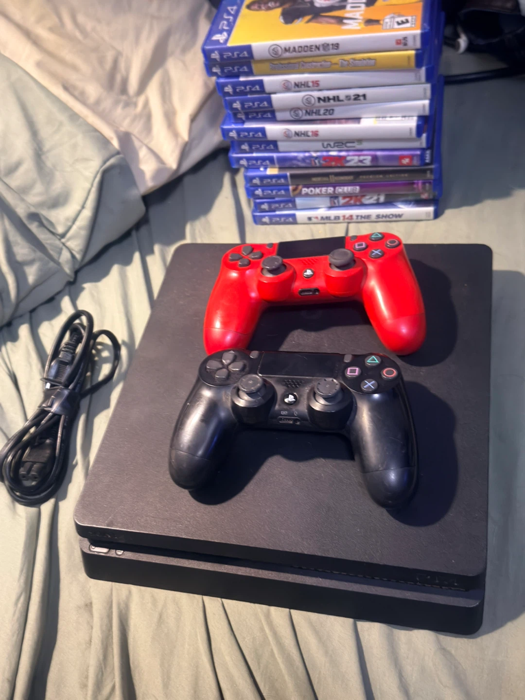 Selling my ps4 with two controllers and 13 games