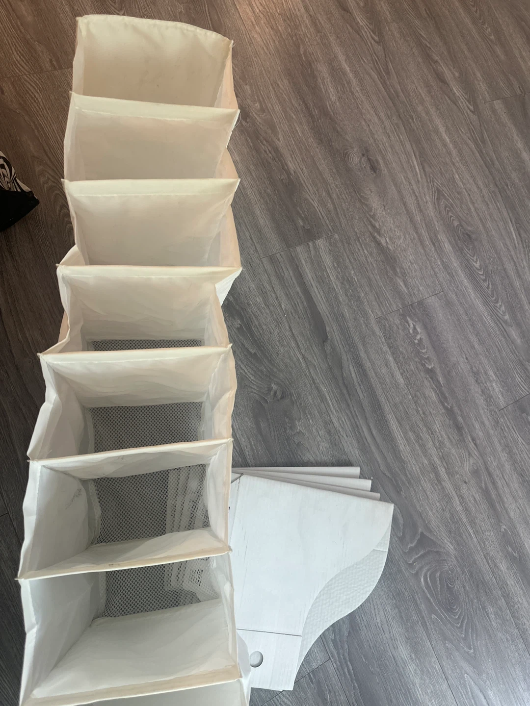 White hanging closet organizer with 6 shelves