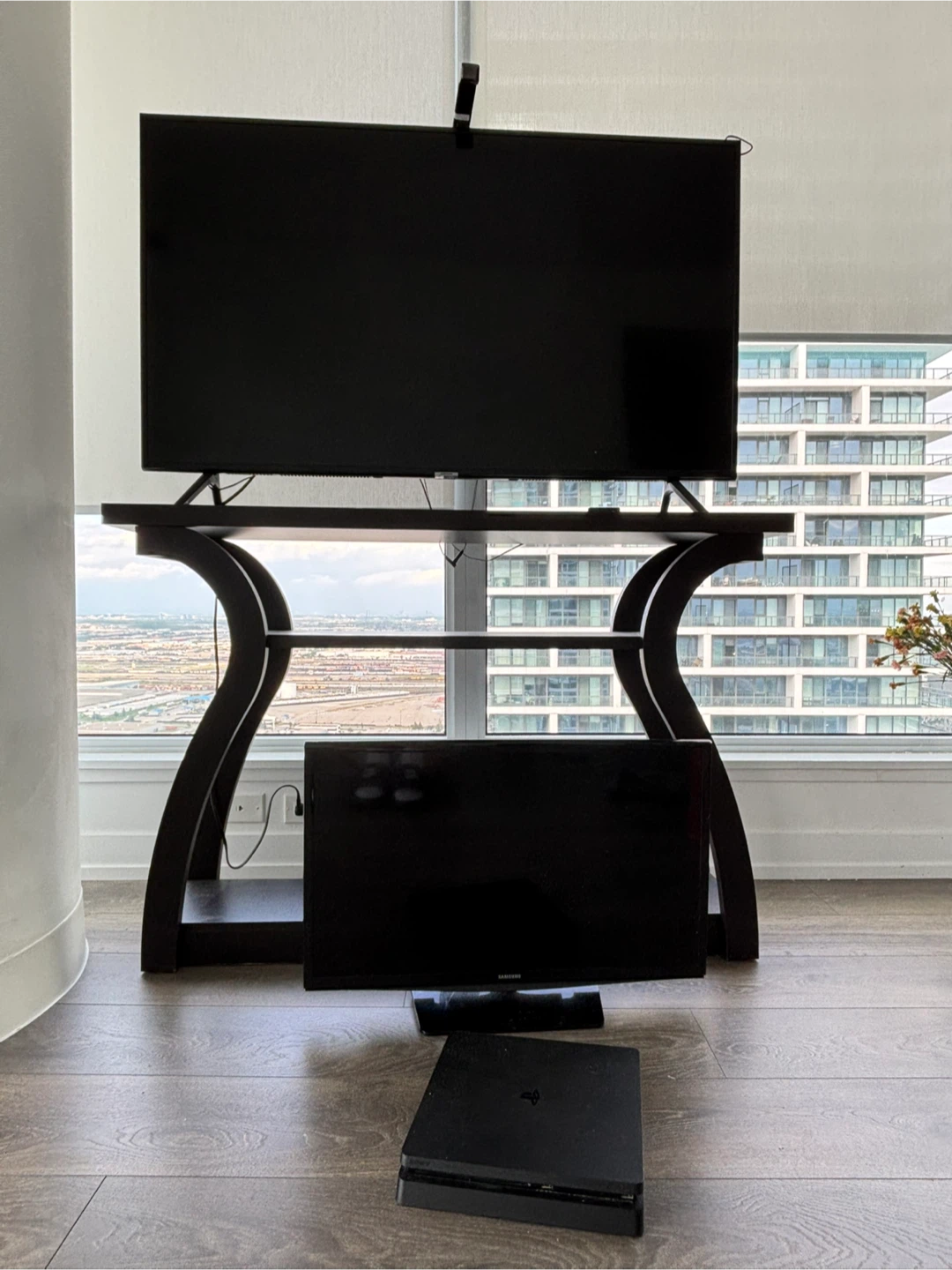 Set of TV stand, monitor, and PS4