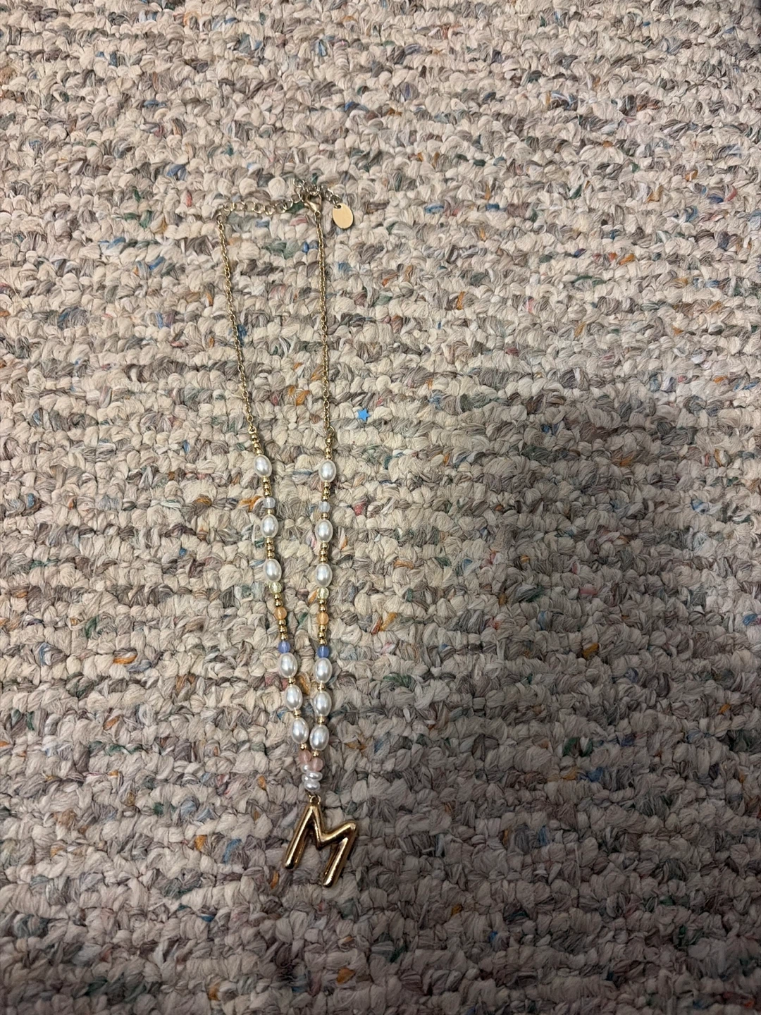 Gold Tone M initial pendant necklace with pearls