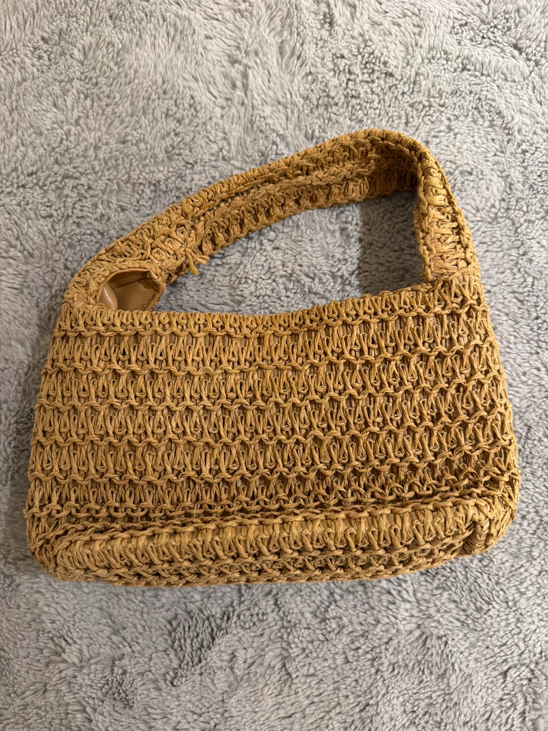 Woven straw handbag