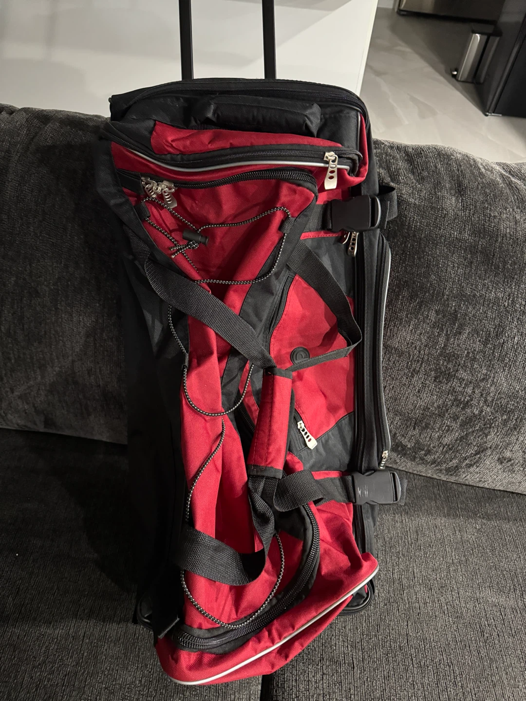 Red and Black Rolling Duffel Bag on wheels - photo 5